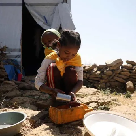 Mekdes spends most of her time looking after her 11-month-old cousin and taking care of the house chores.