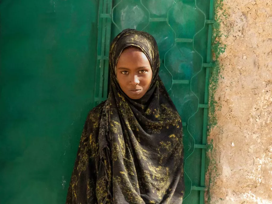 Patenschaft für Mädchen; Mädchen mit Kopftuch