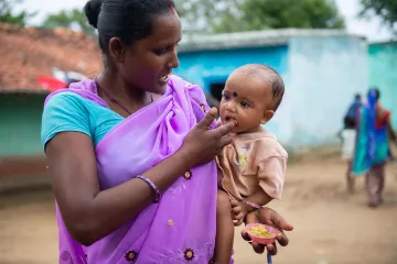 Mutter mit Baby in Indien