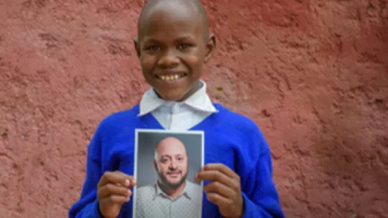 Patenkind mit Bild vom Paten