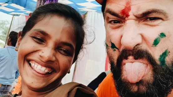 Patenkind und Paul lachen miteinander