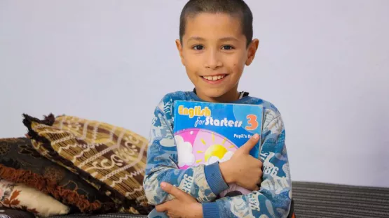 Geflüchteter Junge aus Syrien